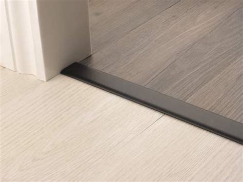 Aluminium door bars threshold strip transition trim laminate tiles various sizes. Self Adhesive Cover Strips - Ceramics & LVT | Quality ...