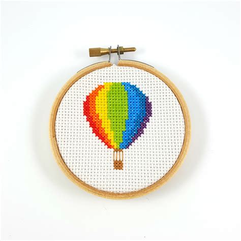 finished rainbow hot air balloon cross stitch ringcat design
