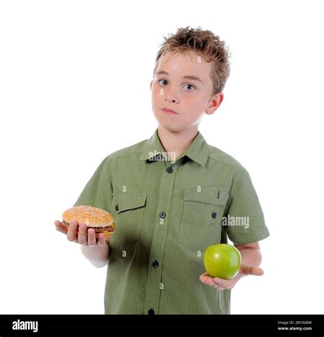 Little Boy Eating A Hamburger Stock Photo Alamy