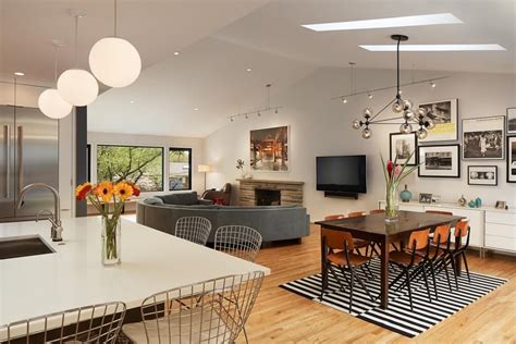 The Open Floor Plan Of The Kitchen And Living Spaces Allows For