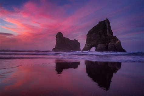 Choose beach holiday packages to auckland, rotorua and more! Wharariki Beach, New Zealand