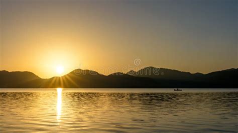Beautiful Sunrise Over Lake Stock Photo Image Of Canoe Morning 99297272