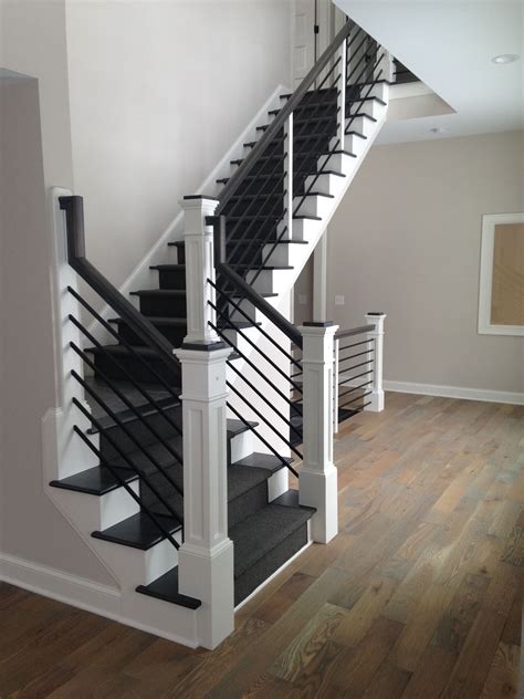 These Black Stairs Covered With A Charcoal Grey Runner Stair Railing