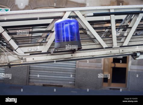 Blue flashing beacon on a crane Stock Photo - Alamy