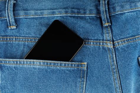 Premium Photo Black Smartphone In Pants Pocket