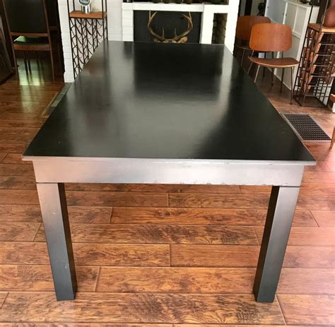 Help me find another item like this from your stock: Rare Black Lacquered Rectangular Dining Table by Roy ...