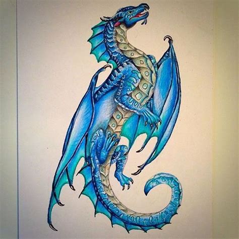Fairy tattoos can be large or small, black or colorful, happy or sad, cute or evil. Lovable blue fairy dragon tattoo design - Tattooimages.biz