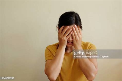 Asian Awkward Face Photos And Premium High Res Pictures Getty Images