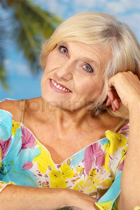 older woman on vacation stock image colourbox