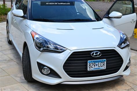 Transmission options consist of a. 2013 Hyundai Veloster Turbo - Pearl White - Black / Blue ...