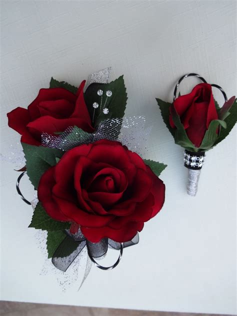 2 piece wrist corsage and boutonniere in red roses
