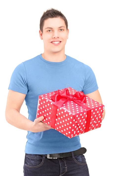 Smiling Handsome Guy Holding A Present Stock Image Image Of Handsome