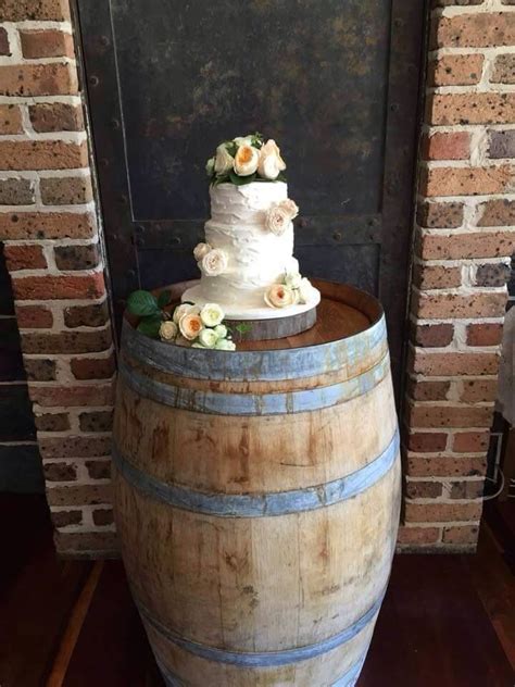 rustic wedding cake on wine barrel rustic wedding cake rustic wedding wedding flowers