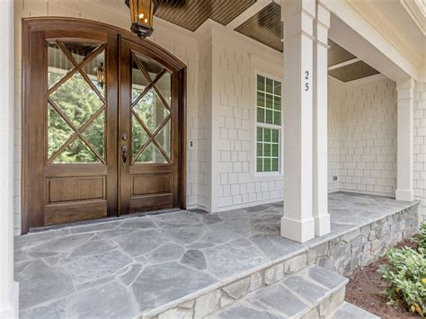 Or, perhaps you're eager to get that crumbling pathway to the front door fixed up. Flagstone porch and beautiful doors by Horizon Custom ...
