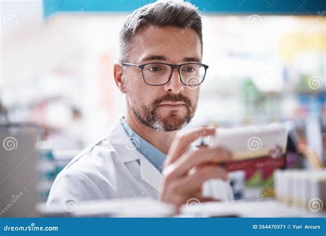 Healthcare Knowledge You Can Trust. a Mature Pharmacist Doing Inventory