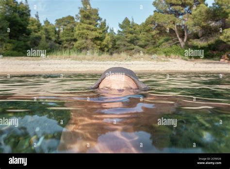 Forehead Swimming Man Fully Submerged Down Water Sunny Day Hi Res Stock