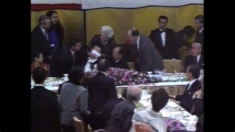George H W Bush Being Tended To After He Vomited On Japanese Prime Minister Kiichi Miyazawa And