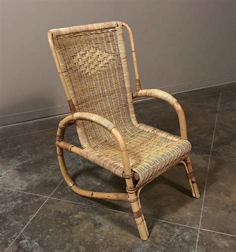 Submitted 8 days ago by kolyastiy. Mid-Century Rattan Lounge Chair and Footstool by Huis ...