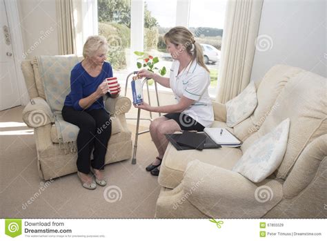 Nurse Offering Advice On Drug Taking Stock Image Image Of Home