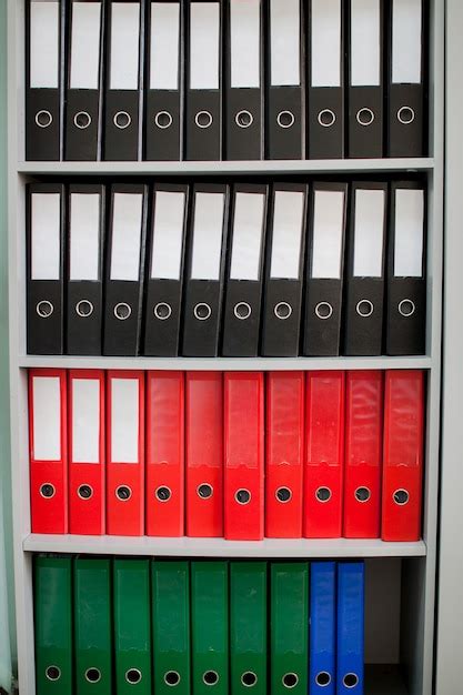 Premium Photo Colorful Archive Folders For Documents On The Shelves