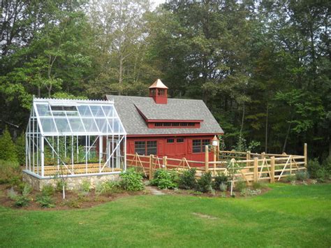 A Greenhouse Barn And Vegetable Garden