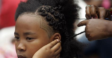 A low fade to the sides. A South African High School Has Banned Girls From Afros ...