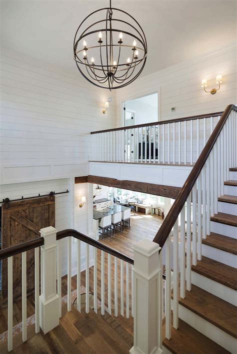 There are many farmhouse foyer design ideas, and it often seems like no two are alike. Classic lakeside home in Minnesota features modern ...