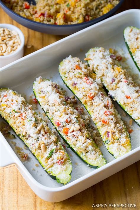 These easy stuffed zucchini boats are the perfect light summer dinner! Stuffed Zucchini Boats with Quinoa and Pine Nuts