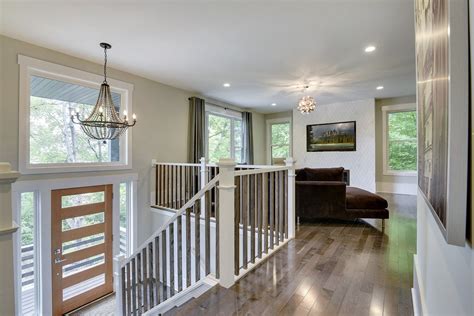 Split Level Home Entry Way And Living Room Design By Emjrupp Split