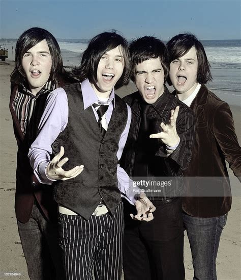 Members of the band Panic! At The Disco pose at a portrait session ...