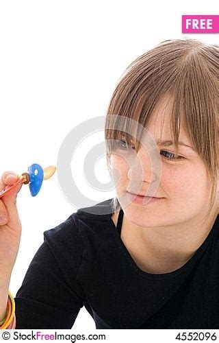 The Young Amusing Girl With A Dummy Isolated Free Stock Images