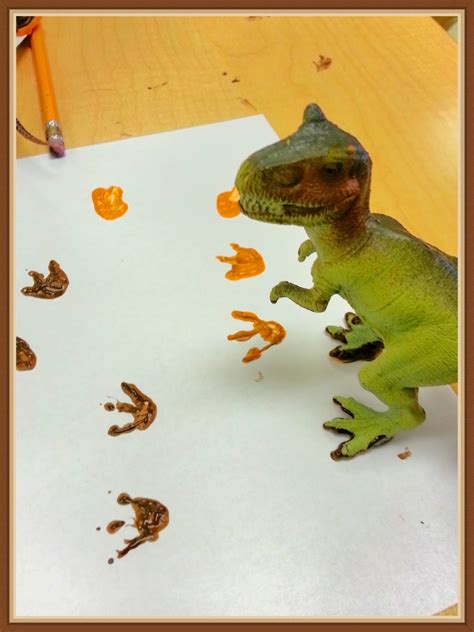 Crafts For Kiddos Dinosaur Tracks Art Project Using Dinosaur Toys