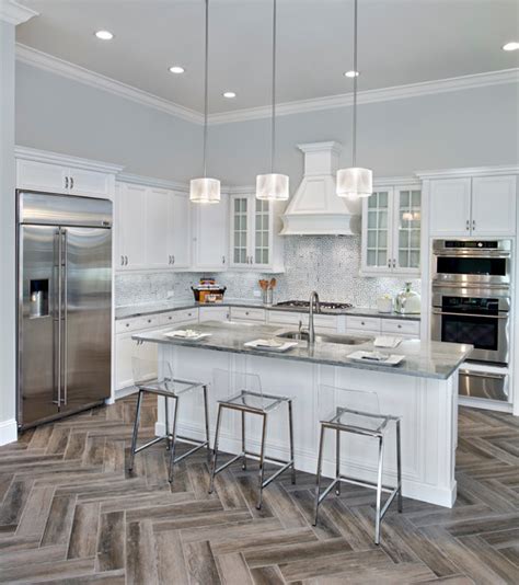 If you've convinced yourself that white kitchen cabinets are totally boring and #basic, check these out. Wood Look Tile Floor White Kitchen Cabinet Designs