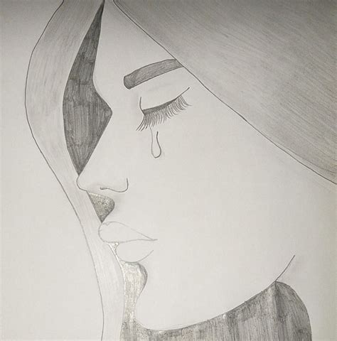 pencil sketch of a girl crying