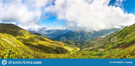 Panorama Mountain Landscape With Blue Sky And White Clouds Stock Photo