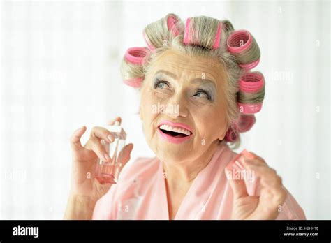 Senior Woman In Hair Rollers Stock Photo Alamy