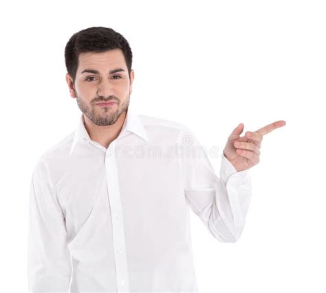 Isolated Handsome Young Man Is Pointing With Index Finger Stock Image