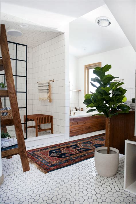 We love how this designer highlighted the zoey contemporary bathtub using porcelain tile. Modern Vintage Bathroom Reveal | brepurposed