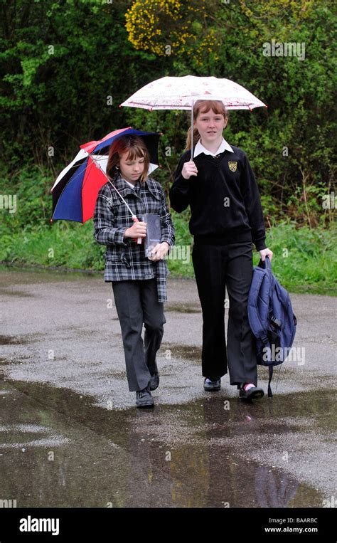 Children Walking To School In The Rain Stock Photo 23594800 Alamy