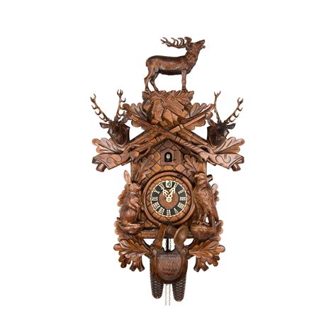 Carved 8 Day Hunting Style Cuckoo Clock With Large Stag Mounted Stag