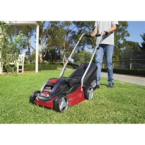 Because they're battery powered, cordless lawn mowers are a convenient way to mow small and medium sized lawns. Ozito Power X Change 2 x 18V Cordless Mower Kit | Bunnings ...