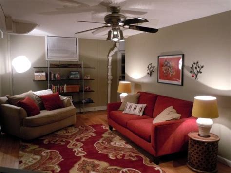 Believe it or not, red and grey pairs really well together. cozy living room with red couch | Red couch living room ...