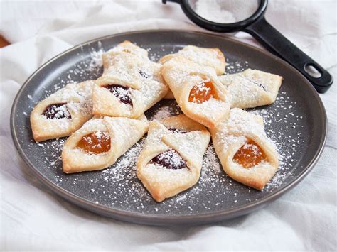 Add the sour cream, melted butter, sugar, vanilla, salt and the softened yeast. kolache cookies