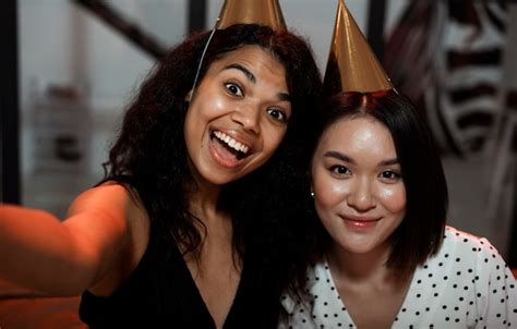 Free Photo Women Taking A Selfie At New Years Eve Party