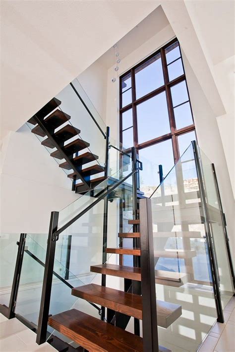 Tall Vertical Window On The Stairwell Usual House Staircase Design