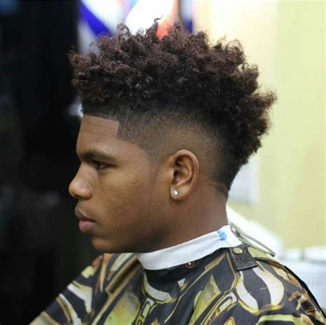 The mohawk fade is one particular trend that works for every single hair type, and that's why it's at the top of our list. 50 Fade and Tapered Haircuts For Black Men