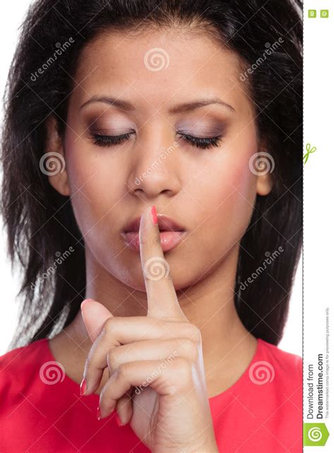 Woman With Finger On Lips Showing Silence Gesture Stock Photo Image