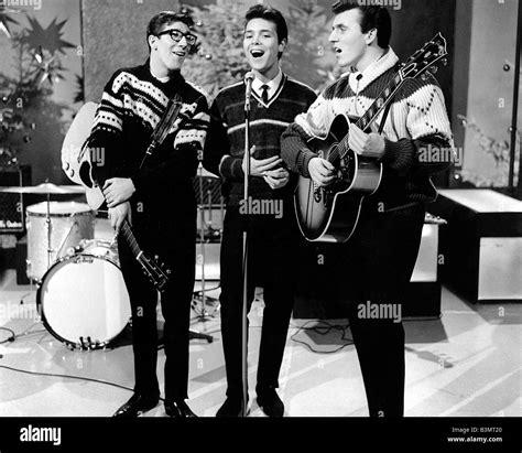 Cliff Richard With Shadows Members Hank Marvin At Left And Bruce Welch On The Uk Tv Show