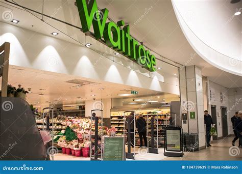 Entrance To Waitrose Grocery Supermarket Shop In Modern Shopping Mall