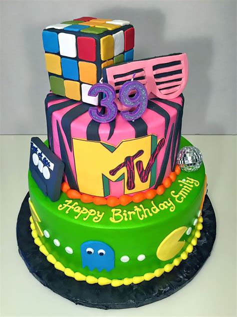 This Is A 39th Birthday Cake With An 80s Theme It Has 2 Tiers With
